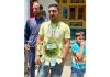 Bijbehara youth Waseem Raja who won Rs 2 cr in Dream 11. -Excelsior/Sajad Dar