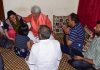 Lt Governor Manoj Sinha consoling the family members of Rahul Bhat during visit to his residence at Durga Nagar, Jammu on Tuesday.