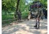 Troops at the site of encounter in Kulgam on Sunday. —Excelsior/Sajad Dar