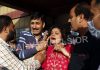 Family members of Rahul Bhat mourn outside hospital in Srinagar. —Excelsior/Shakeel