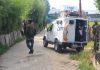 Security personnel at the encounter site at Gundipora, Pulwama on Monday. — Excelsior/Younis Khaliq