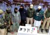 Militants arrested at Pattan in Baramulla on Tuesday. -Excelsior/Aabid Nabi