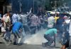 Protesters being teargassed at Sheikhpora in Budgam on Friday. — Excelsior/Shakeel