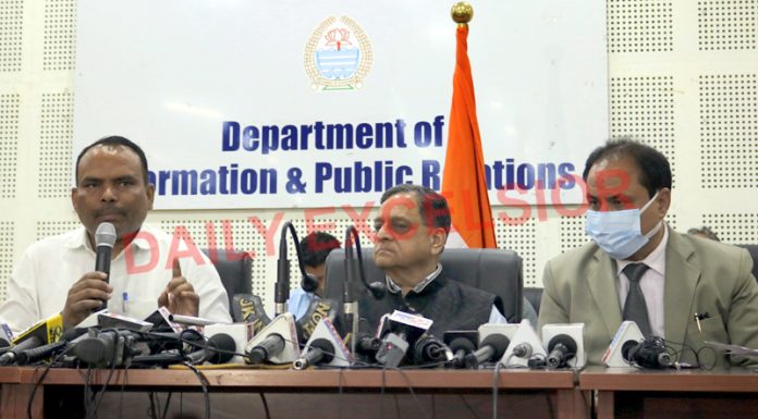 Divisional Commissioner Kashmir P K Pole addressing a press conference in Srinagar on Wednesday. —Excelsior/Shakeel