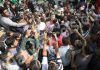 J&K BJP chief Ravinder Raina and senior BJP leader Kavinder Gupta surrounded by angry crowd at Bantalab crematorium in Jammu on Friday.