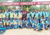Teams posing for a group photograph alongwith officials at Country Cricket Stadium, Gharota in Jammu.