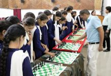 Players evincing keen interest in Chess during seminar at Noushera, organised under “My Youth My Pride.”