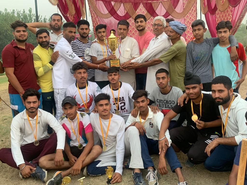Winners being awarded with trophy by dignitaries at Marh in Jammu on Monday. Winners being awarded with trophy by dignitaries at Marh in Jammu on Monday.