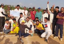 Players celebrating while posing for photograph at Country Cricket Stadium, Gharota Jammu.