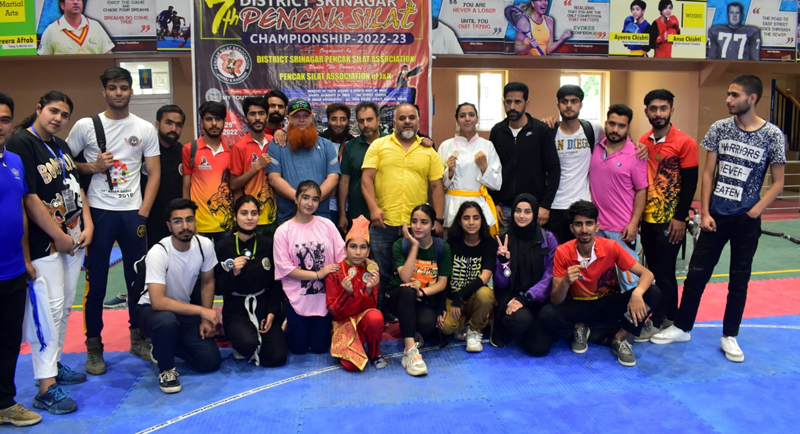 Winners displaying medals while posing with dignitaries at Srinagar on Sunday. Winners displaying medals while posing with dignitaries at Srinagar on Sunday.