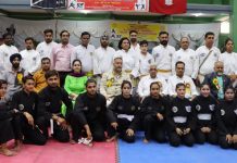 Participating players and officials of Pencak Silat Championship posing for group photograph during the inaugural ceremony at University of Jammu on Tuesday.