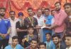 Dignitaries presenting trophy to the captain of the winning team at Domana in Jammu on Monday.