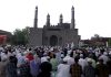 Members of Muslim community offering Eid Prayers at Eidgah Jammu on Tuesday. -Excelsior/Rakesh
