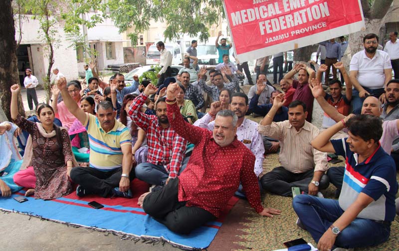 Employees during a protest at Directorate of Health Services Complex, Jammu. -Excelsior/Rakesh Employees during a protest at Directorate of Health Services Complex, Jammu. -Excelsior/Rakesh