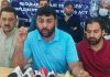 PHE casual daily wagers president Sajad Ahmad Parray addressing a press conference in Srinagar. —Excelsior/Shakeel