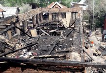 Damage caused by fire in interiors of Dal Lake in Srinagar - Excelsior/Shakeel