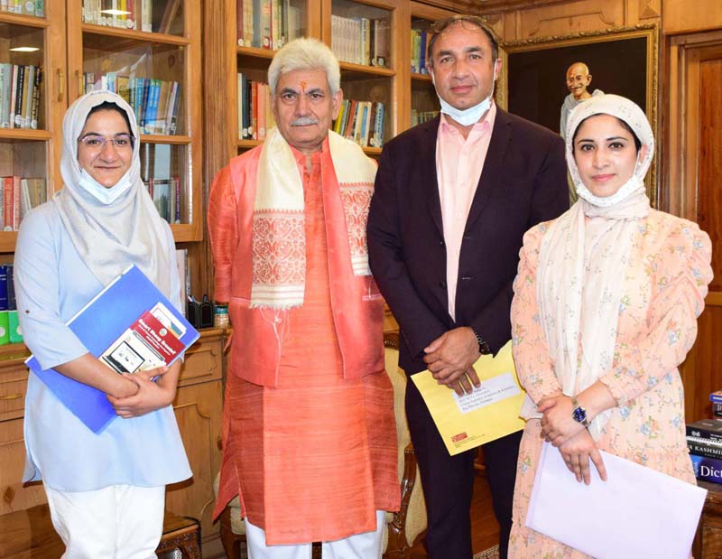 Lt Governor with national award winner students of SKUAST Kashmir. Lt Governor with national award winner students of SKUAST Kashmir.