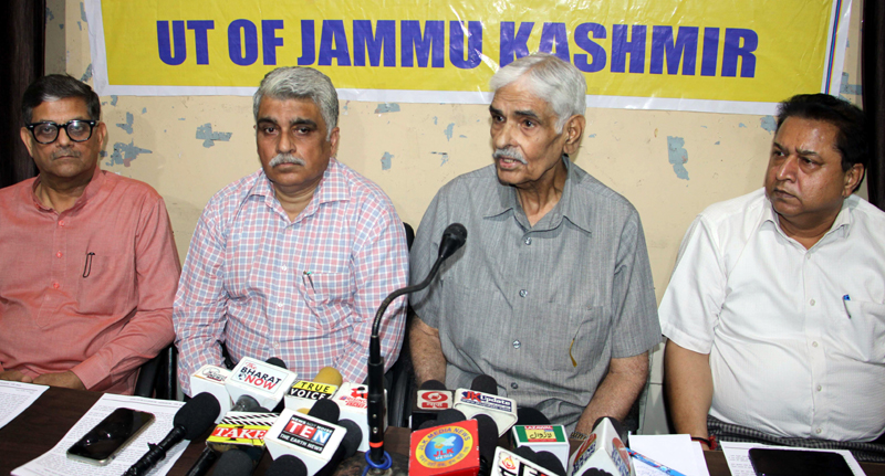 Senior members of Jammu Kashmir People’s Forum addressing press conference in Jammu on Friday. Senior members of Jammu Kashmir People’s Forum addressing press conference in Jammu on Friday.