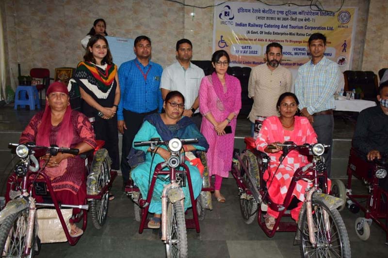 Avny Lavasa posing with Divyangjans after distributing Aids and Assistive devices at Jammu on Thursday.