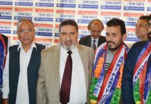 JKAP president Altaf Bukhari alongwith others welcoming new entrants into party at a function in Srinagar.