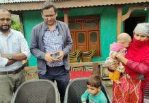 Regional PF Commissioner with families of deceased worker in Ramban on Tuesday.