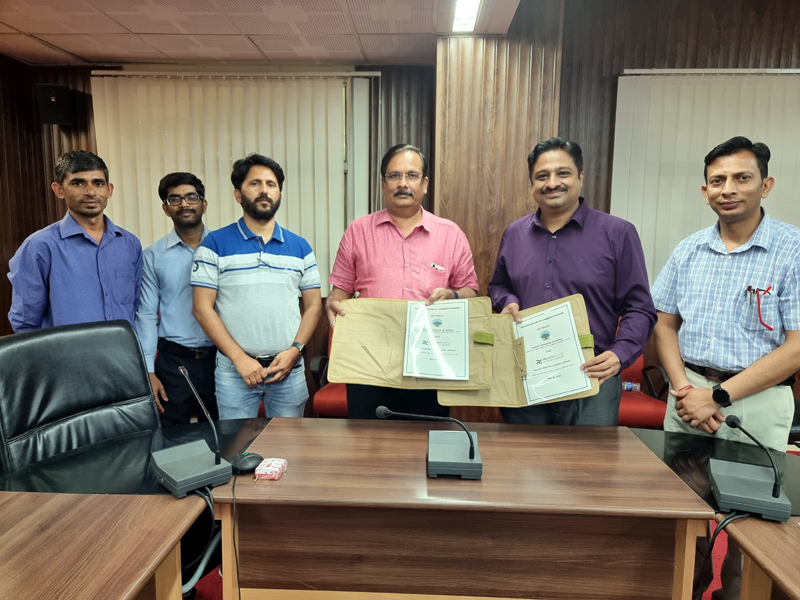 CUJ Vice-Chancellor Prof Sanjeev Jain and Director Prevest Den (Pro) Dr S Sai Kalyan displaying copies of MoU signed on Friday.