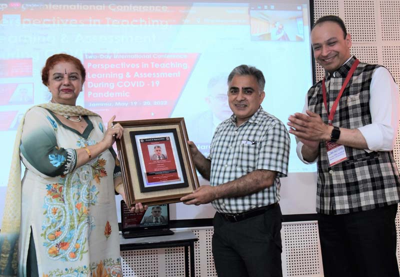 Chairperson of MIER Group of Institutions presenting a memento to Prof Naresh Padha during a conference on Thursday.