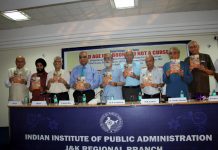 Dignitaries releasing book titled 'Old Age is a boon and not a curse'.