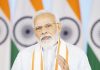 Prime Minister Narendra Modi addressing on the occasion of 80th birthday celebration of Ganapathy Sachchidananda Swamy Ji via video message, in New Delhi on Sunday. (UNI)