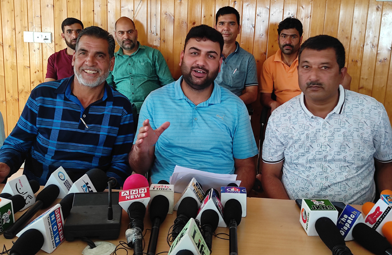 PHE daily wagers addressing press conference in Srinagar. — Excelsior/Shakeel PHE daily wagers addressing press conference in Srinagar. — Excelsior/Shakeel