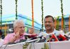 Delhi Chief Minister Arvind Kejriwal and Transport Minister Kailash Gahlot addressing at the flag-off of 150 new electric buses, in New Delhi on Tuesday. (UNI)