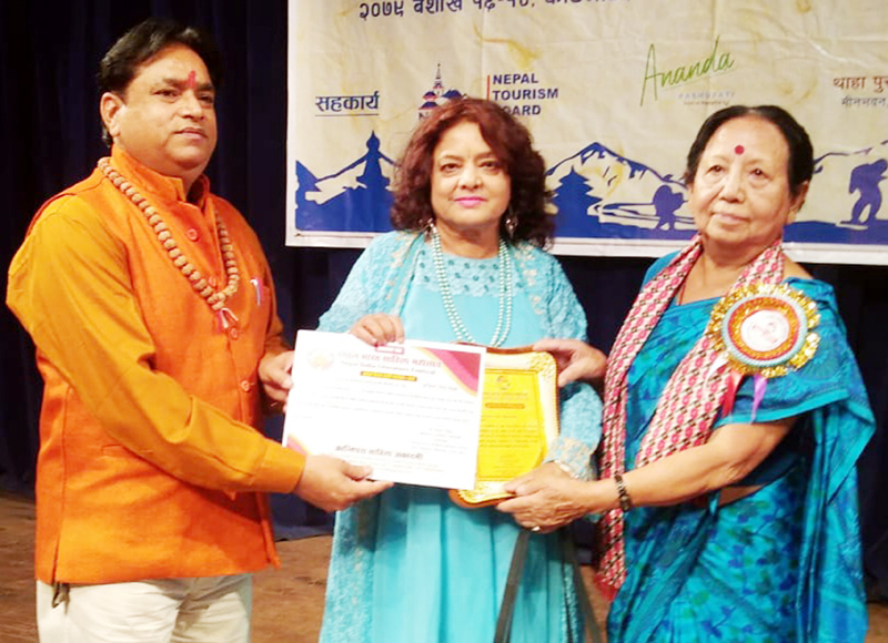 Eminent poetess, painter and artist, Anila Singh Charak receiving Amrita Pritam Samman in Nepal. Eminent poetess, painter and artist, Anila Singh Charak receiving Amrita Pritam Samman in Nepal.