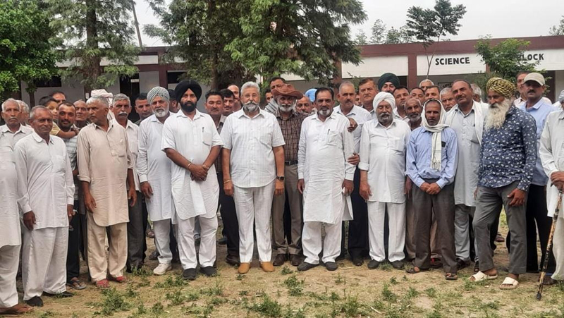 AIJMS president Ch Manmohan along with community members posing for a group photograph. AIJMS president Ch Manmohan along with community members posing for a group photograph.