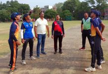 Umpires and captains during toss of coin at GGM Science Hostel Ground in Jammu on Friday.