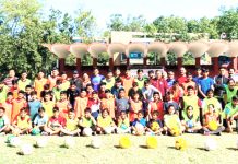 Young budding footballers posing for a group photograph with coaches at Dehradun on Wednesday.