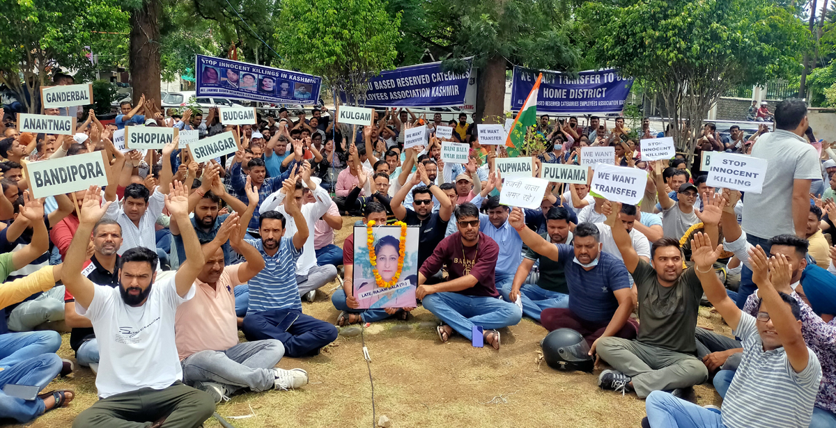 Reserved category employees posted in Kashmir, staging protest at Panama Chowk in Jammu on Saturday. Reserved category employees posted in Kashmir, staging protest at Panama Chowk in Jammu on Saturday.