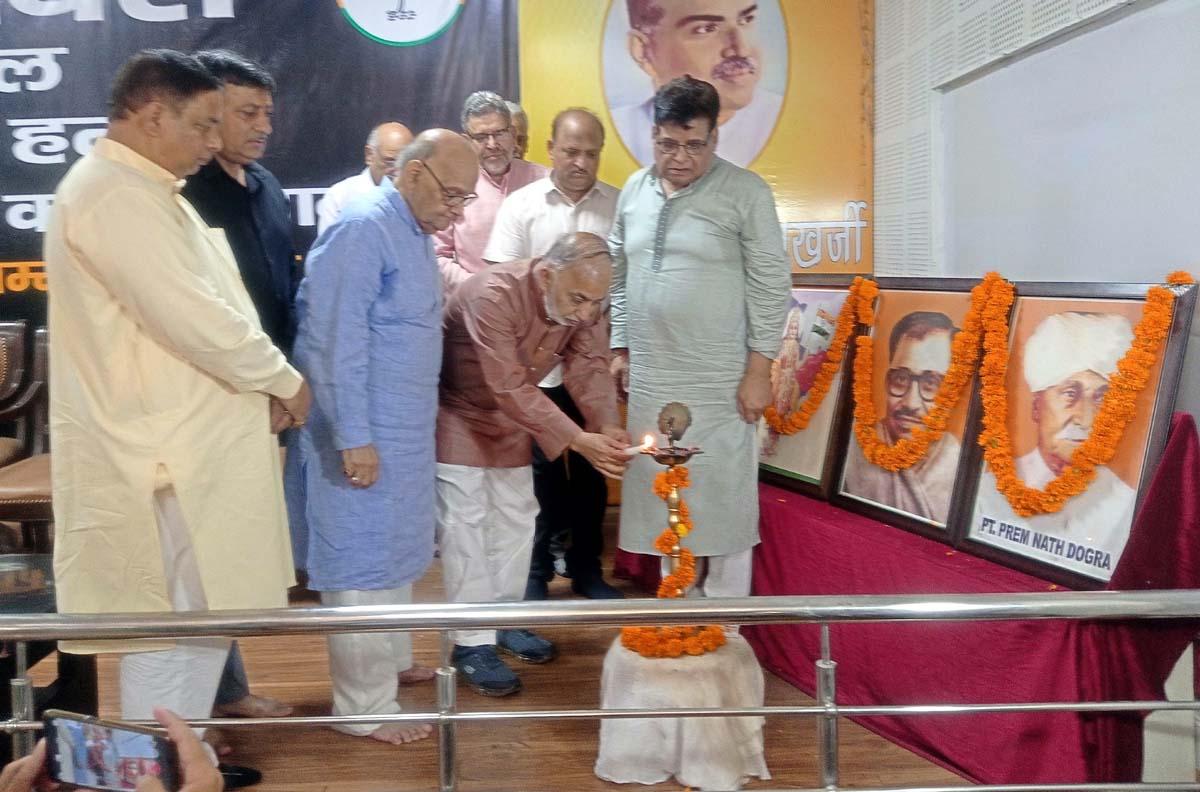 BJP leaders lighting the lamp at a programme held at party Headquarters, Trikuta Nagat on Saturday.