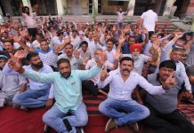 PHE employees staging protest dharna during their strike at BC Road office complex in Jammu on Saturday. —Excelsior/ Rakesh