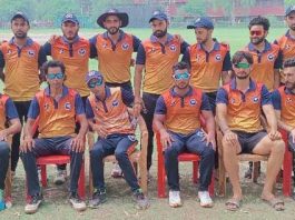 Triumphant JKCA A2 team posing alongwith coach at GGM Science College Hostel Ground in Jammu.