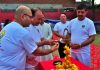 Member Parliament, Jugal Kishore Sharma and others lighting the lamp during celebration of Yoga at AIIMS in Jammu on Thursday.