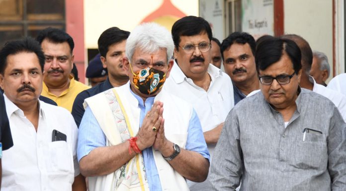 Lt Governor Manoj Sinha being welcomed by BJP workers at Jai Prakash Narayan Airport in Patna on Sunday. (UNI)