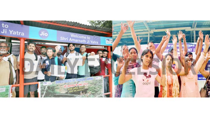 Shri Amarnathji yatris displaying their registration slips at Bhagwati Nagar Yatri Niwas Jammu (left) and pilgrims chanting "Bum Bum Bhole'' after their arrival at Yatri Niwas Pantha Chowk, Srinagar on Tuesday (Right). -Excelsior pics by Rakesh & Shakeel