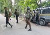 Security personnel at the site of encounter at Kulgam on Wednesday. - Excelsior/Sajad Dar