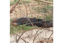 Body of the intruder shot dead by the BSF along International Border in R S Pura sector of Jammu on Monday. (UNI)