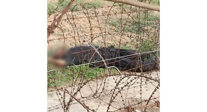 Body of the intruder shot dead by the BSF along International Border in R S Pura sector of Jammu on Monday. (UNI)