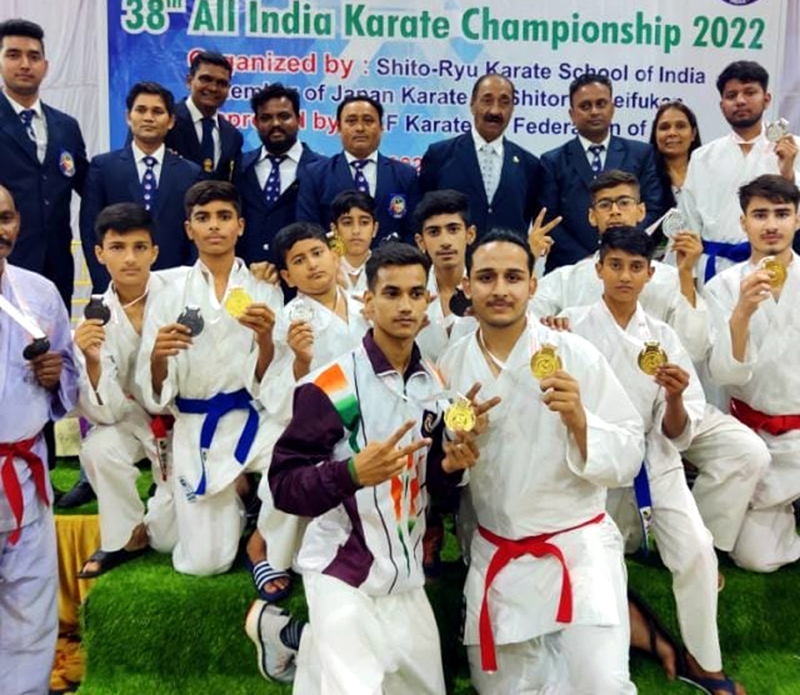 Winners displaying medals while posing with dignitaries on Thursday. Winners displaying medals while posing with dignitaries on Thursday.