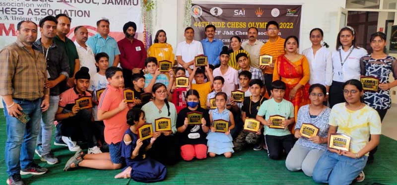 Players displaying trophies while posing with dignitaries at IDPS School Jammu on Saturday. Players displaying trophies while posing with dignitaries at IDPS School Jammu on Saturday.