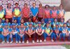 Players posing alongwith CAC Member Roopali Slathia and other officials in Jammu on Sunday.