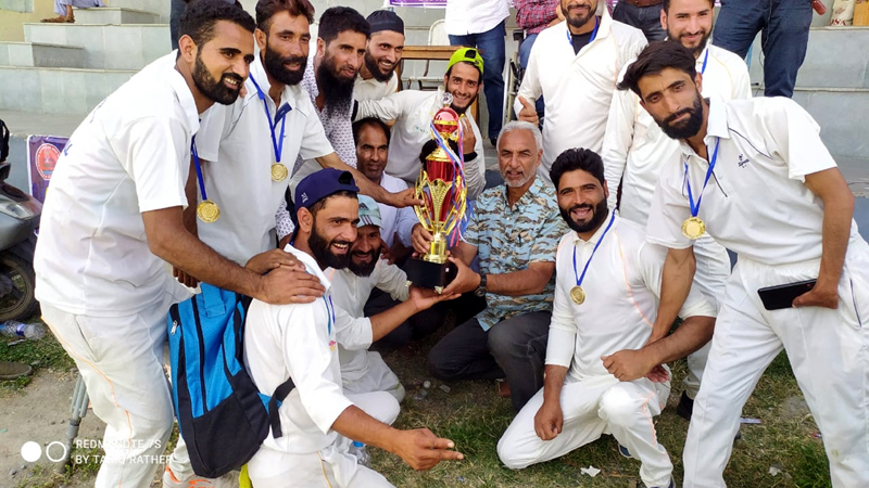 Winners being awarded with trophy by a dignitary at Srinagar on Tuesday. Winners being awarded with trophy by a dignitary at Srinagar on Tuesday.
