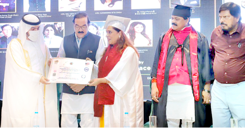 Philanthropist Ritu Singh receiving Nelson Mandela Peace Award from Sheikh Majid Rashid Al Mualla (ruling family member of UAE) at Hari Niwas, Jammu. Philanthropist Ritu Singh receiving Nelson Mandela Peace Award from Sheikh Majid Rashid Al Mualla (ruling family member of UAE) at Hari Niwas, Jammu.